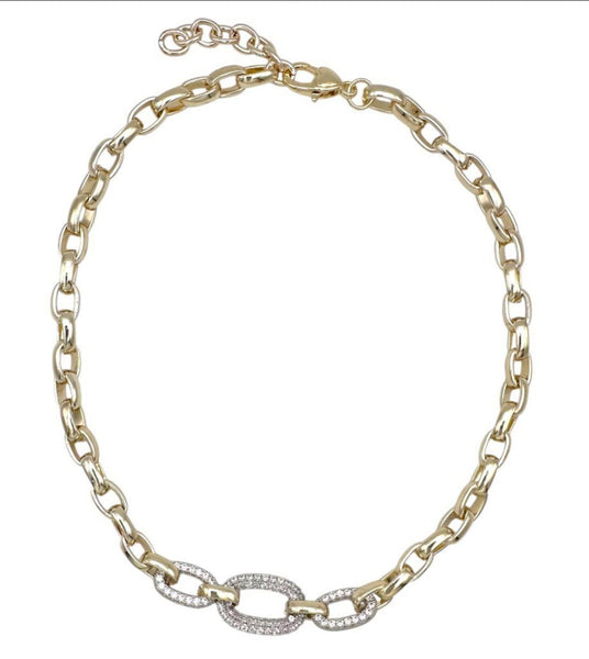 Collar dorado con aros plateados