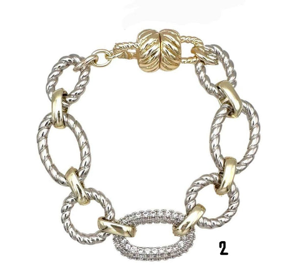 Pulseras de imán plateadas con diamantes