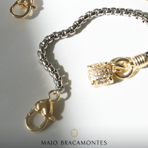 Pulsera plateada con dije dorado - MAJO BRACAMONTES JOYERIA 