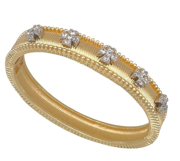Pulsera clutch dorada con cruces